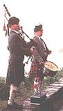 [Scottish bagpiper and drummer]
