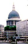 [St. Paul's cathedral surrounded by modern buildings]